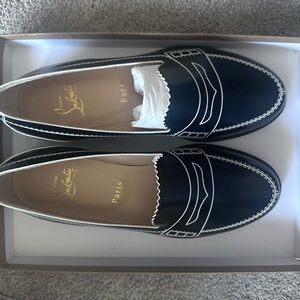 Christian Louboutin Elegant Black and White Flats